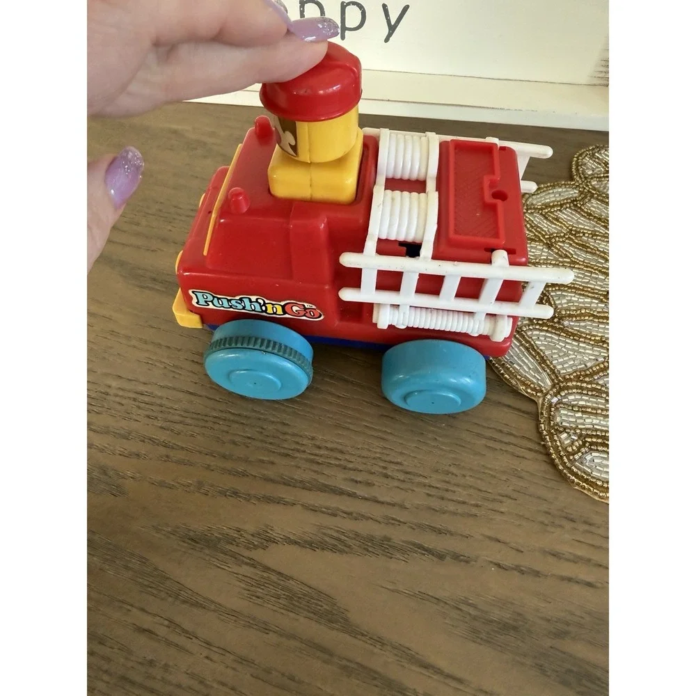 Vintage Push N Go Fire Truck Toy 1975 TOMY Taiwan‎ Pop Up Driver Vehicle